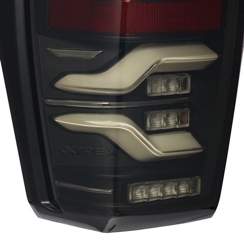 Load image into Gallery viewer, AlphaRex 16-21 Toyota TacomaLUXX LED Taillights Blk w/Activ Light/Seq Signal