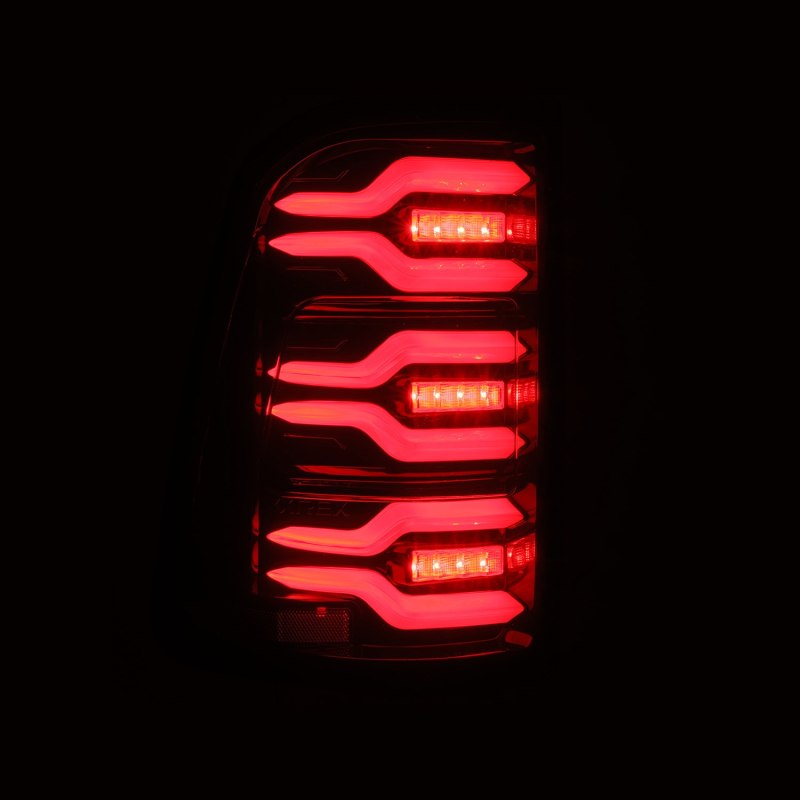 Load image into Gallery viewer, AlphaRex 19-21 Dodge Ram 1500 Luxx-Series LED Tail Lights Black/Red w/Activ Light/Seq Signal