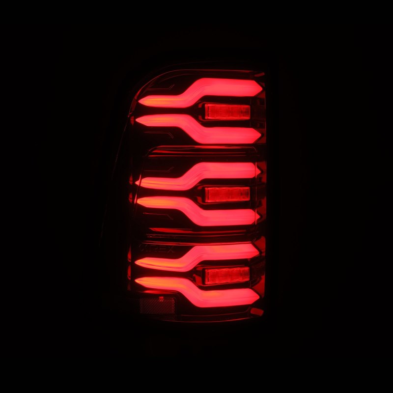 Load image into Gallery viewer, AlphaRex 19-21 Dodge Ram 1500 Luxx-Series LED Tail Lights Black/Red w/Activ Light/Seq Signal