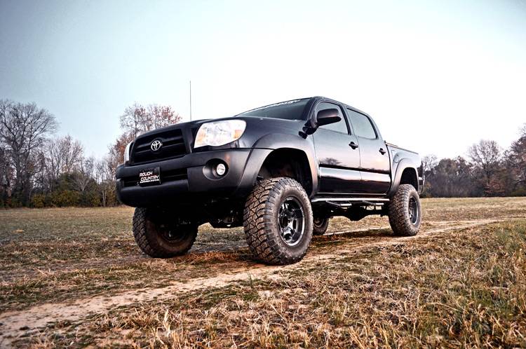 Load image into Gallery viewer, Rough Country | 2005-2015 Toyota Tacoma 2WD / 4WD 4 Inch Lift Kit