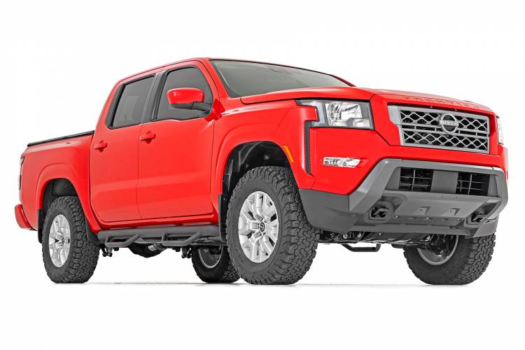 Load image into Gallery viewer, Rough Country | 2005-2024 Nissan Frontier 2WD / 4WD 2.5 Inch Lift Kit - No Struts (Red Spacer)