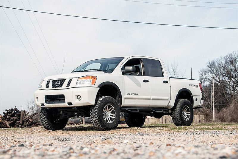 Load image into Gallery viewer, Rough Country | 2004-2015 Nissan Titan 2WD / 4WD 4 Inch Lift Kit