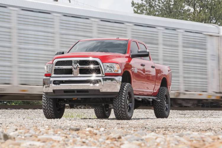 Load image into Gallery viewer, Rough Country | 2014-2018 Dodge Ram 2500 4WD 5 Inch Coil Spacer Radius Arm Drop Lift Kit | 35720