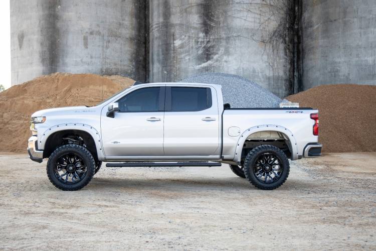 Load image into Gallery viewer, Rough Country | 2019-2024 GM 1500 / 2500 HD / 3500 HD Black Oval Nerf Steps - Crew Cab - DEF Tank