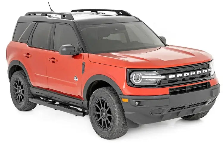 Load image into Gallery viewer, Rough Country | 2021-2023 Ford Bronco Sport Crew Cab 4WD Black Oval Nerf Steps | 21006