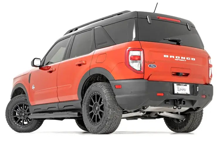Load image into Gallery viewer, Rough Country | 2021-2023 Ford Bronco Sport Crew Cab 4WD Black Oval Nerf Steps | 21006