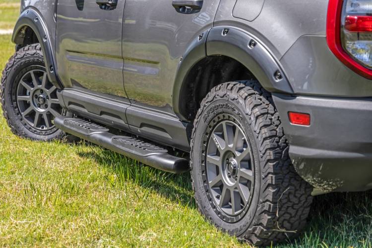 Load image into Gallery viewer, Rough Country | 2021-2023 Ford Bronco Sport Crew Cab 4WD Black Oval Nerf Steps | 21006