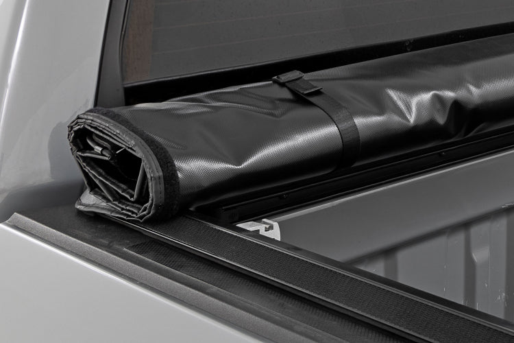 Load image into Gallery viewer, Rough Country | 2007-2021 Toyota Tundra Soft Roll Up 5&#39; 7&quot; Bed Cover
