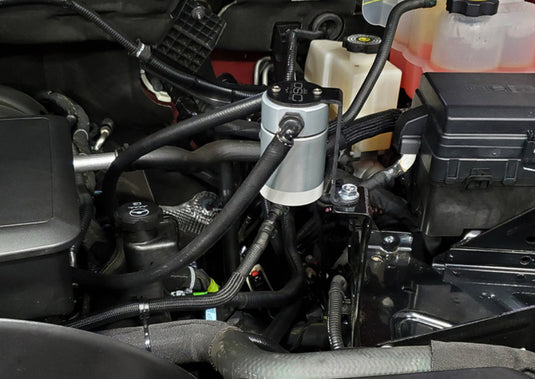 J&L 20-26 Chevy Silverado/GMC Sierra 2500/3500 6.6L Drivers Side Oil Separator 3.0 - Clear Anodi