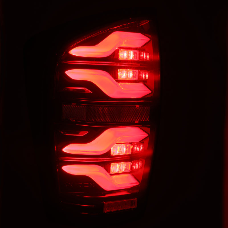 Load image into Gallery viewer, AlphaRex 16-21 Toyota Tacoma LUXX LED Taillights Blk/Red w/Activ Light/Seq Signal
