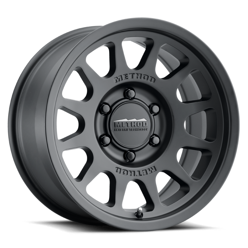 Load image into Gallery viewer, Method | MR703 17x7.5 +50mm Offset 6x130 84.1mm CB Matte Black Wheel
