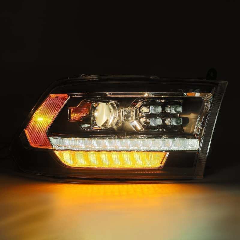 Load image into Gallery viewer, AlphaRex 09-18 Dodge Ram 1500HD PRO-Series Proj Headlight Plnk Style Blk w/Chrm Acc w/Seq Signal/DRL
