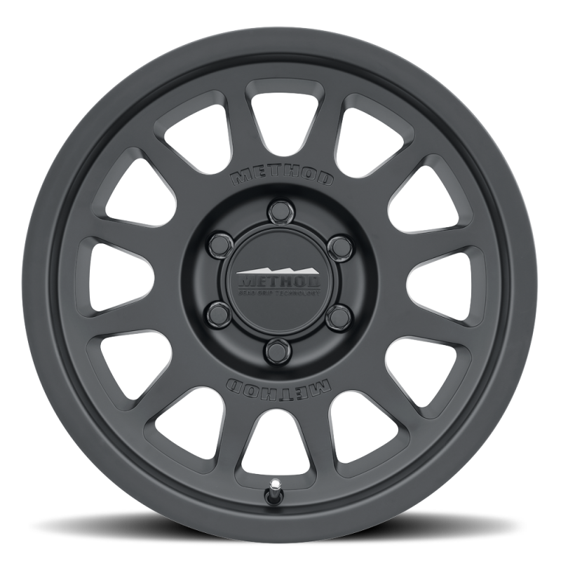 Load image into Gallery viewer, Method | MR703 17x7.5 +50mm Offset 6x130 84.1mm CB Matte Black Wheel
