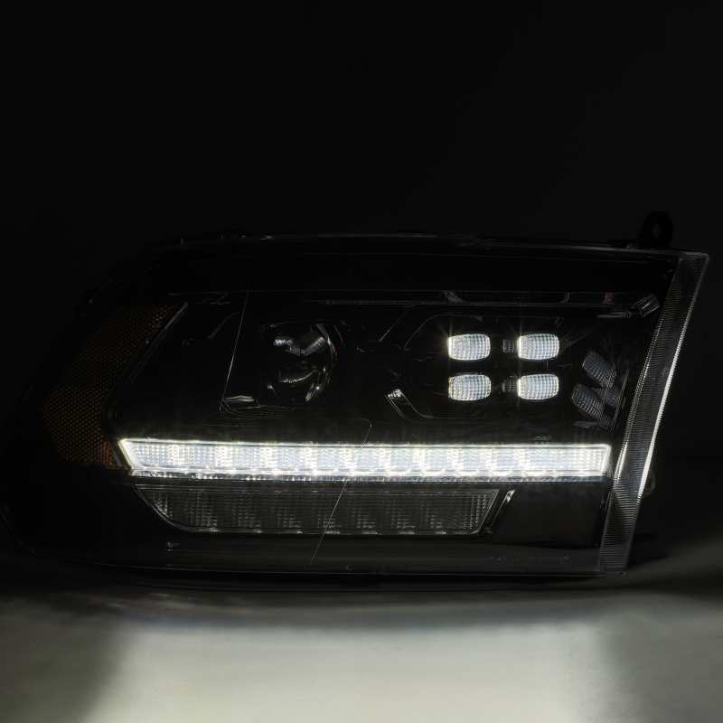 Load image into Gallery viewer, AlphaRex 09-18 Dodge Ram 1500HD PRO-Series Proj Headlight Plnk Style Blk w/Chrm Acc w/Seq Signal/DRL

