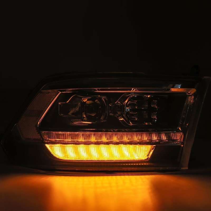 Load image into Gallery viewer, AlphaRex 09-18 Dodge Ram 1500HD PRO-Series Proj Headlight Plnk Style Blk w/Chrm Acc w/Seq Signal/DRL
