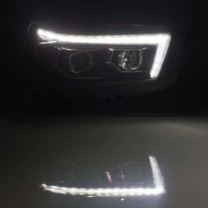 Load image into Gallery viewer, AlphaRex 10-13 Toyota 4Runner LUXX LED Proj Headlights Plank Style Black w/Seq Signal/DRL
