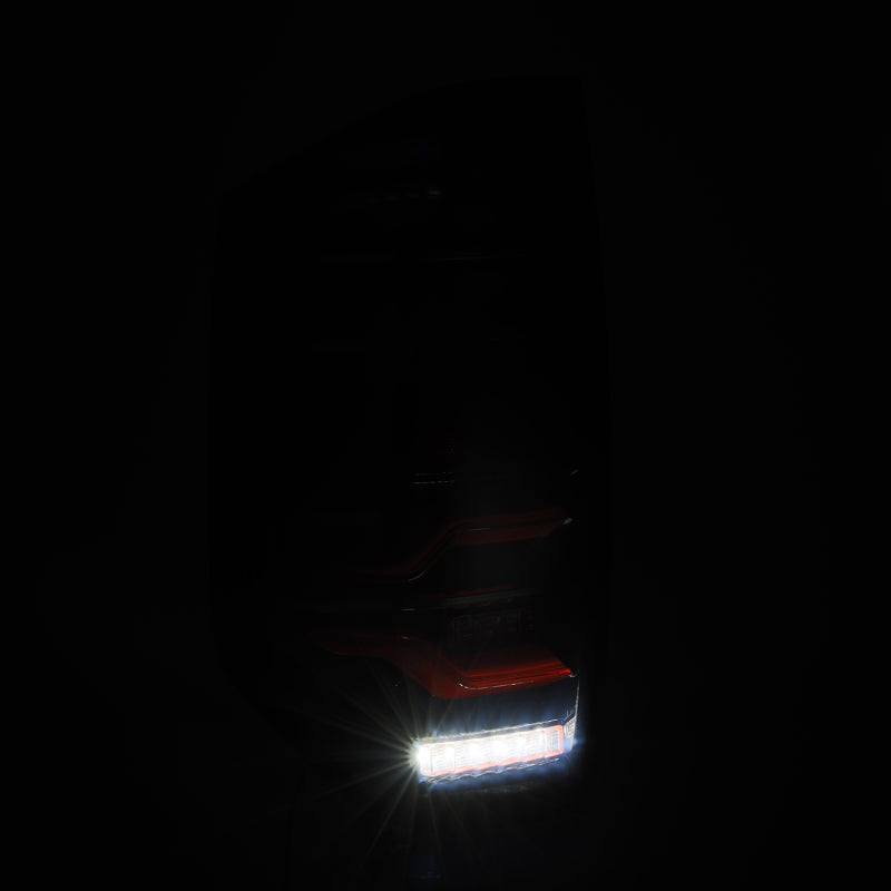 Load image into Gallery viewer, AlphaRex 14-21 Toyota Tundra LUXX LED Taillights Black/Red w/Activ Light/Seq Signal
