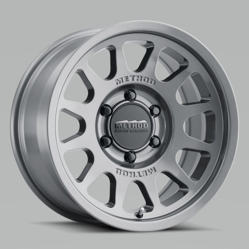 Load image into Gallery viewer, Method | MR703 17x8.5 0mm Offset 6x120 67mm CB Gloss Titanium Wheel
