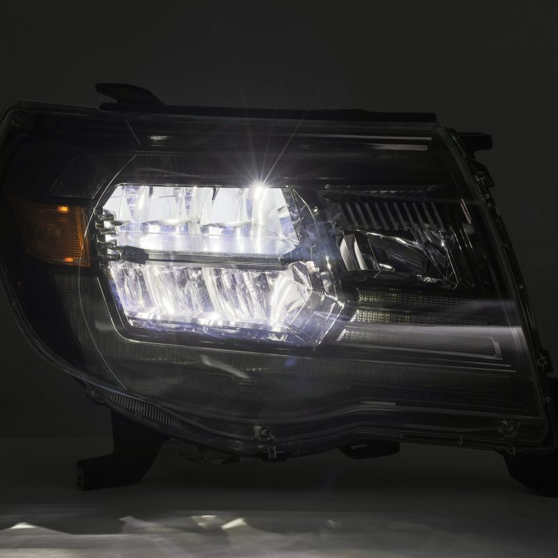 Load image into Gallery viewer, AlphaRex 05-11 Toyota Tacoma LUXX Crystal Headlights Plank Style Alpha Black w/Activation Light/DRL
