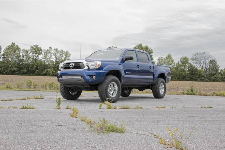 Load image into Gallery viewer, Rough Country | 2005-2023 Toyota Tacoma 2WD / 4WD 3 Inch Inch Lift Kit No Struts (Red Spacers) - Rear V2 Shocks | 74570Red
