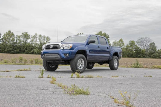 Rough Country | 2005-2023 Toyota Tacoma 2WD / 4WD 3 Inch Inch Lift Kit No Struts (Red Spacers) - Rear V2 Shocks | 74570Red