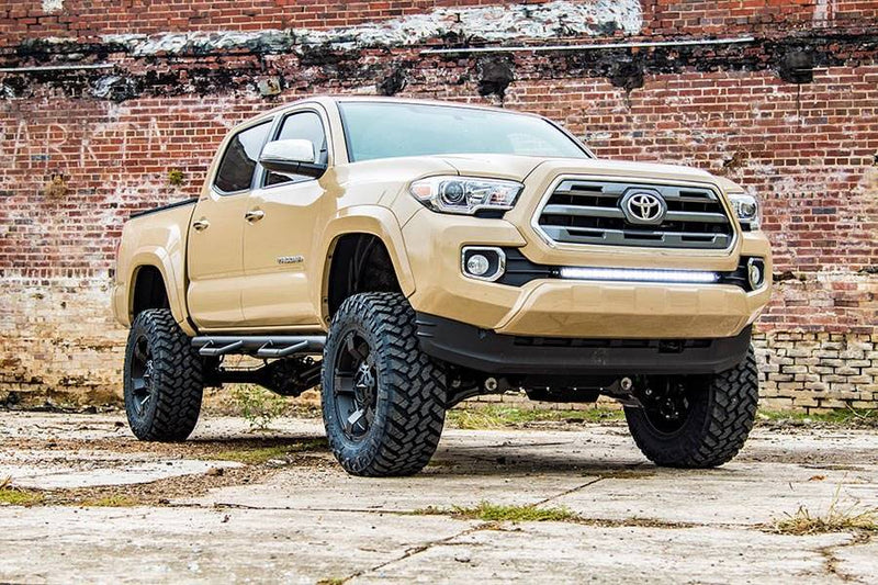 Load image into Gallery viewer, Rough Country | 2016-2023 Toyota Tacoma 2WD / 4WD 6 Inch Lift Kit - M1 Struts With M1 Shocks | 75840
