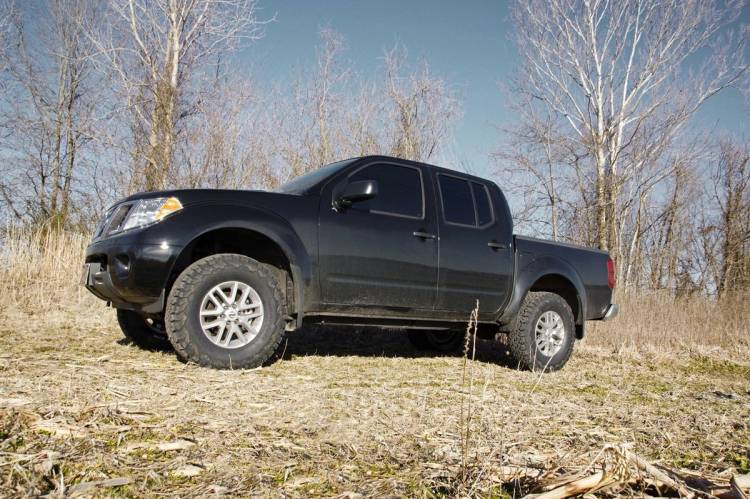 Load image into Gallery viewer, Rough Country | 2005-2024 Nissan Frontier 2WD / 4WD 2.5 Inch Lift Kit - No Struts (Red Spacer)
