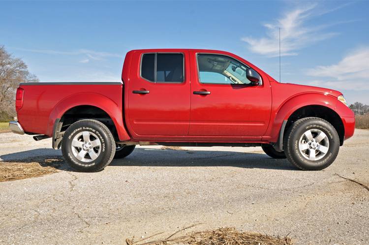 Load image into Gallery viewer, Rough Country | 2005-2024 Nissan Frontier 2WD / 4WD 2.5 Inch Lift Kit - No Struts (Red Spacer)
