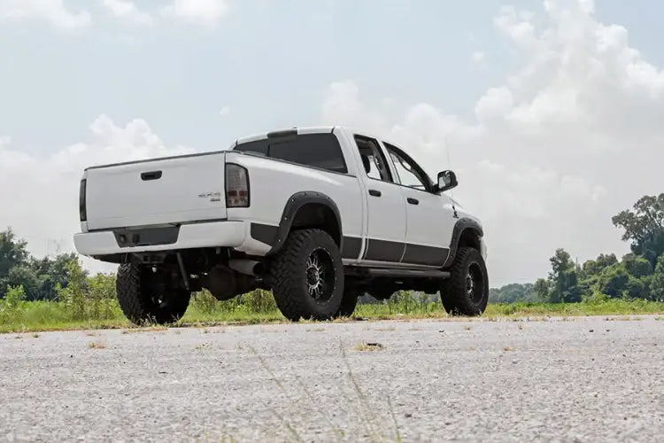 Load image into Gallery viewer, Rough Country | 2003-2013 Dodge Ram 2500 4WD 3 Inch Lift Kit - V2 Shocks
