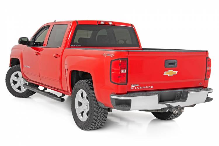 Load image into Gallery viewer, Rough Country | 2007-2019 GM 1500 / 2500 HD / 3500 HD Black Oval Nerf Steps - Crew Cab - DEF Tank
