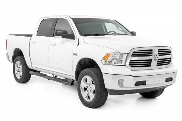 Load image into Gallery viewer, Rough Country | 2010-2023 Dodge Ram 2500 / 3500 Crew Cab Black Oval Nerf Steps
