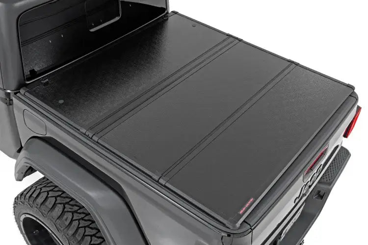 Load image into Gallery viewer, Rough Country | 2020-2022 Jeep Gladiator JT Hard Folding Bed Cover | 45810550A
