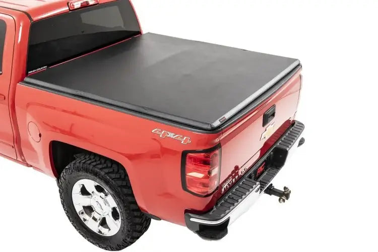 Load image into Gallery viewer, Rough Country | 2014-2018 GM 1500 Silverado / Sierra Soft Tri-Folding Bed Cover - 5&#39; 5 Inch Bed Without Cargo Management System
