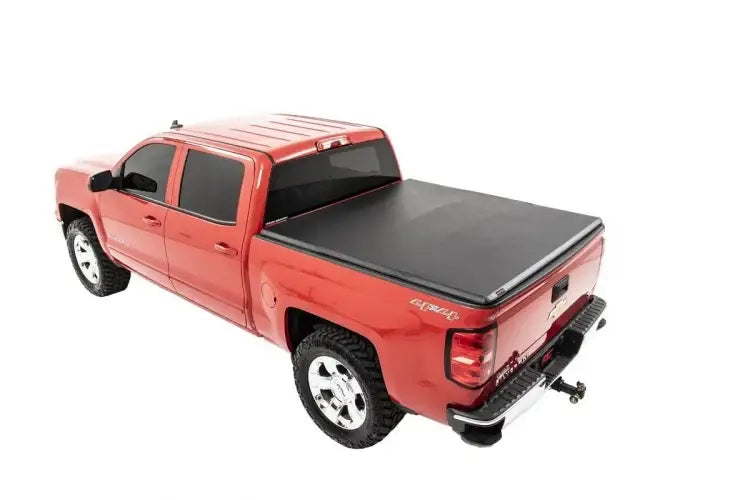 Load image into Gallery viewer, Rough Country | 2014-2018 GM 1500 Silverado / Sierra Soft Tri-Folding Bed Cover - 5&#39; 5 Inch Bed Without Cargo Management System
