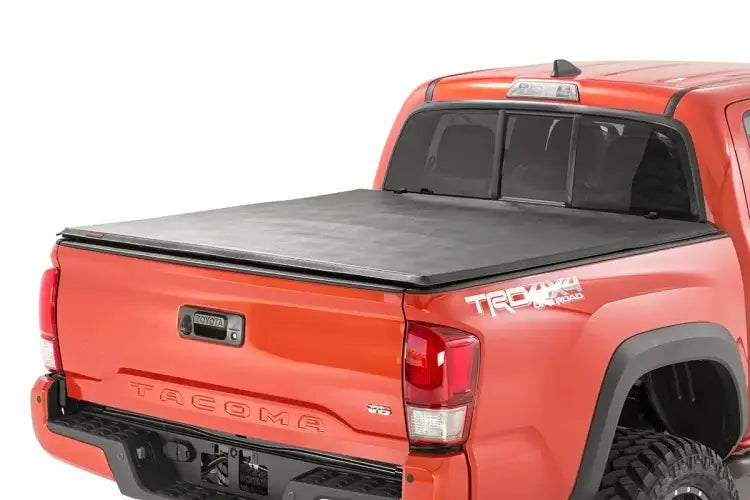 Load image into Gallery viewer, Rough Country | 2005-2015 Toyota Tacoma 5&#39; Soft Tri-Fold Bed Cover | RC44705501
