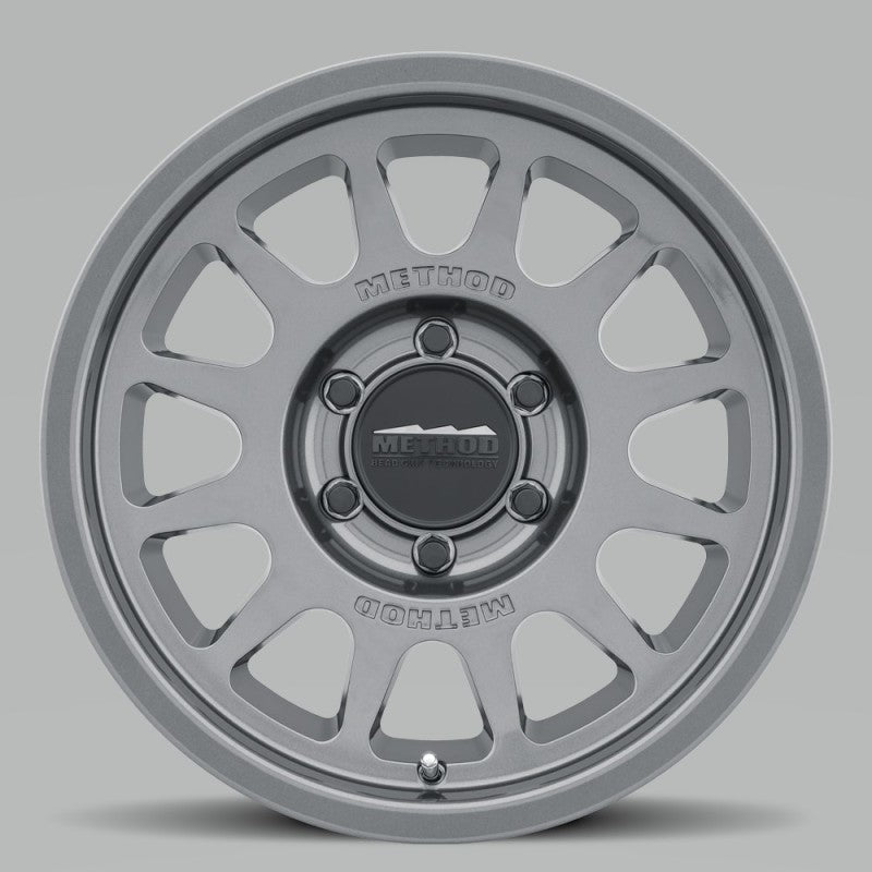 Load image into Gallery viewer, Method | MR703 17x8.5 0mm Offset 6x120 67mm CB Gloss Titanium Wheel
