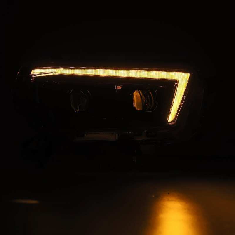 Load image into Gallery viewer, AlphaRex 10-13 Toyota 4Runner LUXX LED Proj Headlights Plank Style Alpha Black w/Seq Signal/DRL
