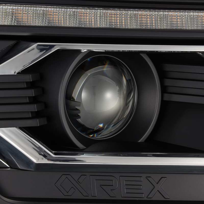 Load image into Gallery viewer, AlphaRex 12-15 Toyota Tacoma LUXX LED Projector Headlights Plank Style Black w/DRL
